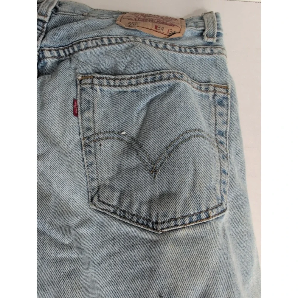 VTG Y2K Levis 550 Jeans Men's 34x34 Denim Made In USA Med Wash Light Fade 2001